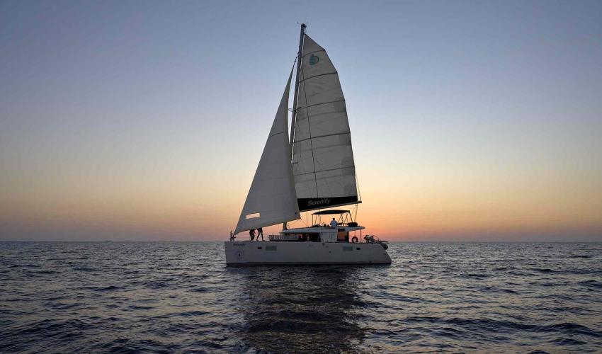 Caldera Classic Sunset Semi-Private Catamaran Cruise